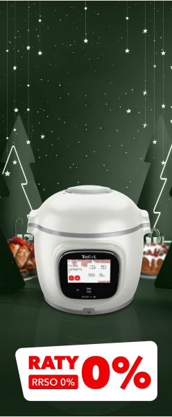 Bia?y multicooker z wy?wietlaczem, na kt?rym widnieje logo Tefal oraz kilka ikon i napis?w. W tle wida? ?wi?teczne dekoracje z choinkami i gwiazdkami, a na dole znajduje si? napis: Raty 0% RRSO 0%.